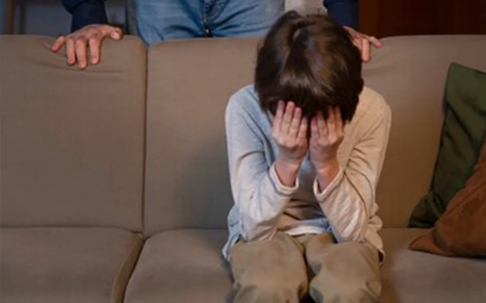 An emotional scene of a distressed child and a concerned parent, symbolizing child-parent conflict
